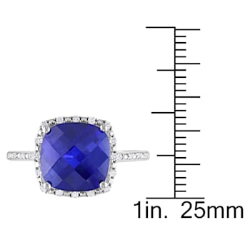 5 3/4 CT TGW Created Blue Sapphire and 1/10 CT TW Diamond Halo Ring in
Sterling Silver