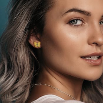 1/4 CT TGW Created Alexandrite Butterfly Stud Earrings in Yellow Plated
Sterling Silver