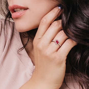7/8 CT TGW Ruby and 1/5 CT TW Diamond Tilted Teardrop Halo Ring in 14K
Yellow Gold