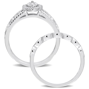 1/5 CT TW Diamond Oval Halo Bridal Ring Set in Sterling Silver