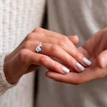 2 5/8 CT TGW Sky Blue Topaz and Morganite with 1/10 CT TW Diamond Toi et
Moi Ring in Sterling Silver