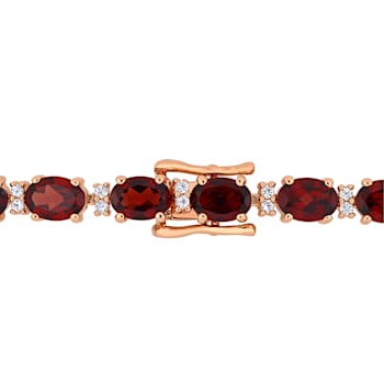 19 5/8 CT TGW Garnet and White Sapphire Tennis Bracelet in Rose Plated
Rhodium Over Sterling Silver