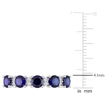 1 5/8 CT TGW Created Blue and White Sapphire Semi-Eternity Ring in
Sterling Silver