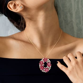 11 1/4 CT TGW Ruby and 1 CT TW Diamond Floral Pendant with Chain in 14K
2-Tone Gold