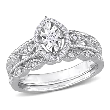 1/5 CT TW Diamond Oval Halo Bridal Ring Set in Sterling Silver