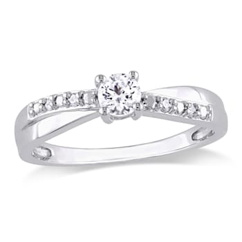 1/3 CT TGW Created White Sapphire and Diamond  Accent Crossover Ring in
Sterling Silver