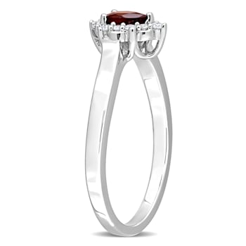 1/4 CTW Garnet and 1/10 CTW Diamond Teardrop Ring in Sterling Silver