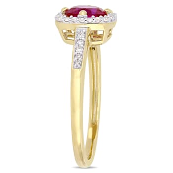 1 CT TGW Created Ruby and 1/7 CT TW Diamond Halo Ring in 10K Yellow Gold