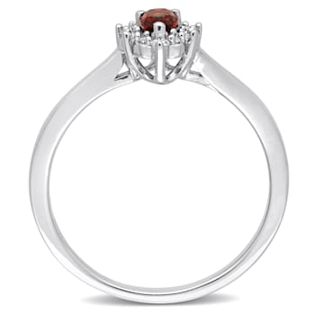 1/4 CTW Garnet and 1/10 CT TW Diamond Halo Ring in Sterling Silver