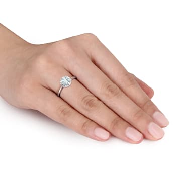 3/4 CT TGW Aquamarine and 1/10 CT TW Diamond Halo Ring in Sterling Silver