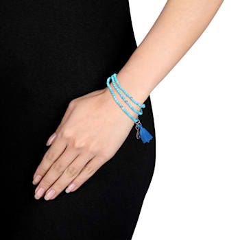20" Dyed Howlite Bead Bracelet with Blue Tassel and Heart Charm in
Sterling Silver