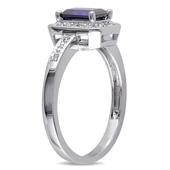 1 1/2 CT TGW Created Blue Sapphire and Diamond Accent Halo Ring in
Sterling Silver