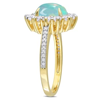 2 1/6 CT TGW Blue Ethiopian Opal, White Topaz and Diamond Ring in Yellow
Plated Sterling Silver