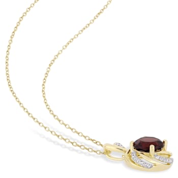 2 1/7 CT TGW Garnet, White Topaz and Diamond Pendant with Chain in
Yellow Plated Sterling Silver