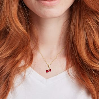 2 5/8 CT TGW Create Ruby and Diaomond Accent Double Heart Pendant with
Chain in 10K Yellow Gold