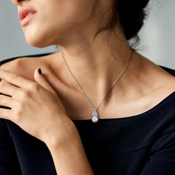11-12MM Freshwater Cultured Pearl and 5/8 CT TGW Aquamarine and Diamond
Pendant in Sterling Silver