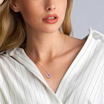 3 CT TGW White Topaz and Amethyst Pendant with Chain in Rose Plated
Sterling Silver