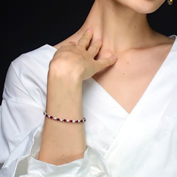 9 7/8 CT TGW Garnet and Diamond Accent Bracelet in Sterling Silver