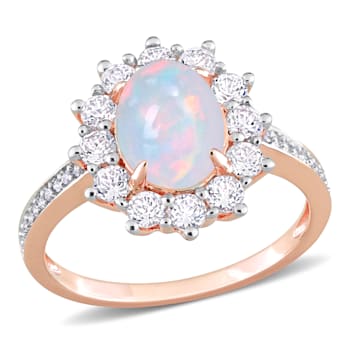 2 1/6 CT TGW Blue Ethiopian Opal, White Topaz and Diamond Accent Ring in
Rose Plated Sterling Silver