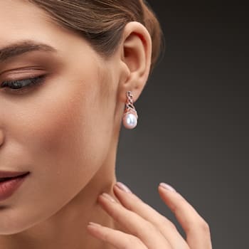 12-12.5MM South Sea Cultured Pearl and 1/3 CT TW Diamond Earrings in
Rose Plated Sterling Silver