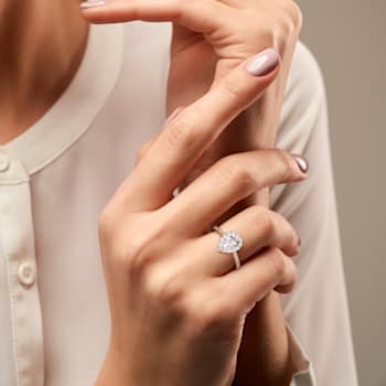 1 7/8 CT TGW Created White Sapphire Halo Teardrop Ring in Yellow Plated
Sterling Silver