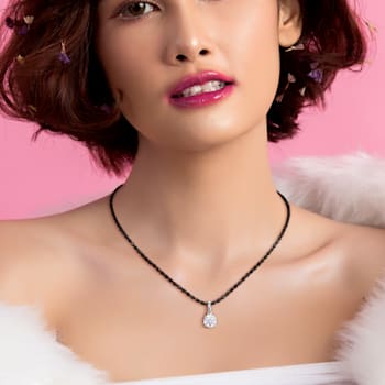 1 CT DEW Created Moissanite Solitaire Pendant, Diamond Cut Chain
Sterling Silver with Black Rhodium