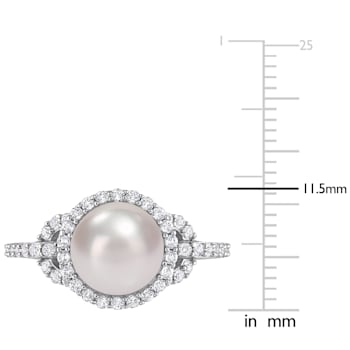 8.5-9MM Freshwater Cultured Pearl and 3/4 CT TGW White Topaz Halo Ring
in Sterling Silver