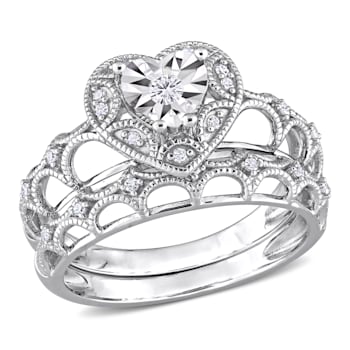 1/7 CT TW Diamond Heart Shape Halo Bridal Ring Set in Sterling Silver