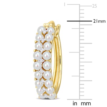 2-2.5MM Freshwater Cultured Pearl and 1/10 CT TW Diamond Hoop Earrings
in 14K Yellow Gold