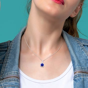 6 2/5 CT TGW Simulated Tanzanite and Created White Sapphire Pendant with
Chain in Sterling Silver
