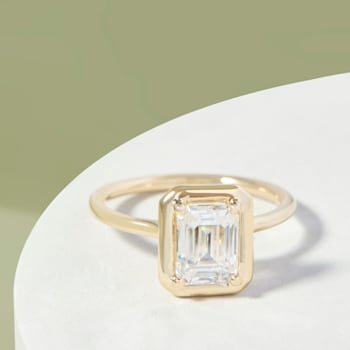 1 3/4 CT DEW Octagon-Shaped Lab Created Moissanite Engagement Ring in
10K Yellow Gold