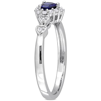 3/8 CT TGW Created Blue and White Sapphire, Diamond Accent Halo Ring in
Sterling Silver