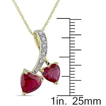 2 5/8 CT TGW Create Ruby and Diaomond Accent Double Heart Pendant with
Chain in 10K Yellow Gold