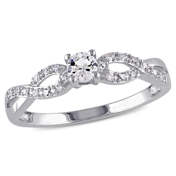 1/4 CT TGW Created White Sapphire and 1/10 CT TW Diamond Infinity Ring
in Sterling Silver