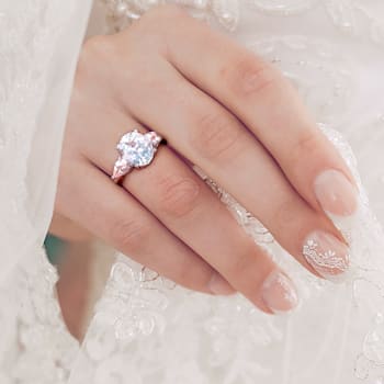 3 CT TGW Ice Aquamarine and Morganite with Diamond Accent 3-Stone
Cocktail Ring in Sterling Silver