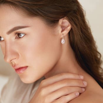 3 5/8 CT TGW Created White Sapphire Teardrop Earrings in Yellow Plated
Sterling Silver