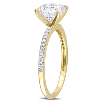 2 CT DEW Created Moissanite and 1/10 CT TW Diamond Engagement Ring in
14K Yellow Gold