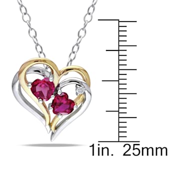 1 1/6 CT TGW Created Ruby and Diamond Accent Heart Pendant with Chain in
2-Tone Sterling Silver