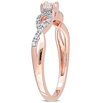 1/4 CT TGW Created White Sapphire and 1/10 CT TW Diamond Infinity Ring
Rose Plated Sterling Silver