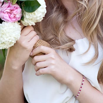 14 1/2 CT TGW Created Ruby and Created White Sapphire Bracelet in
Sterling Silver