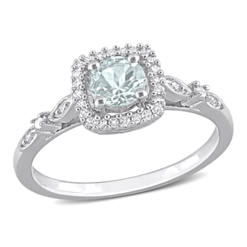 3/8 CT TGW Aquamarine and 1/10 CT TW Diamond Halo Ring in Sterling Silver