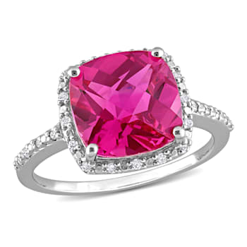 5 3/4 CT TGW Created Pink Sapphire and 1/10 CT TW Diamond Halo Ring in
Sterling Silver