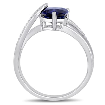 1 7/8 CT TGW Created Blue Sapphire and Diamond Accent Heart Crossover
Ring in Sterling Silver