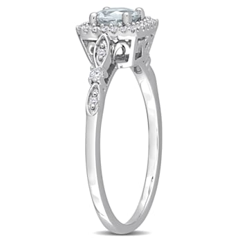 3/8 CT TGW Aquamarine and 1/7 CT TW Diamond Halo Ring in Sterling Silver