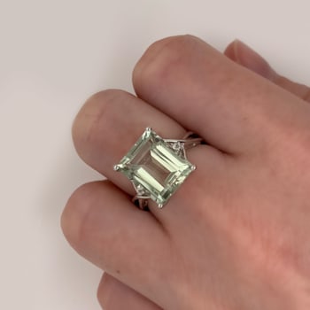 5 5/8 CT TGW Emerald Cut Green Quartz and White Topaz Twist Ring in
Sterling Silver