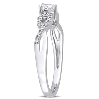 1/4 CT TGW Created White Sapphire and 1/10 CT TW Diamond Infinity
Engagement Ring in Sterling Silver