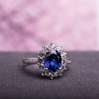 Halo Diamond and 4 CT TGW Created Blue and White Sapphire Ring in
Sterling Silver