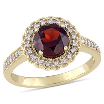 1 5/8 CTW Garnet and 1/8 CT TW Diamond Halo Ring in Yellow Plated
Sterling Silver