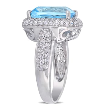 7 1/4 CT TGW Sky Blue Topaz and Created White Sapphire Double Halo Ring
in Sterling Silver