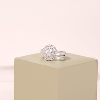 1/4 CT TW Diamond Halo Split Shank Bridal Set in Sterling Silver